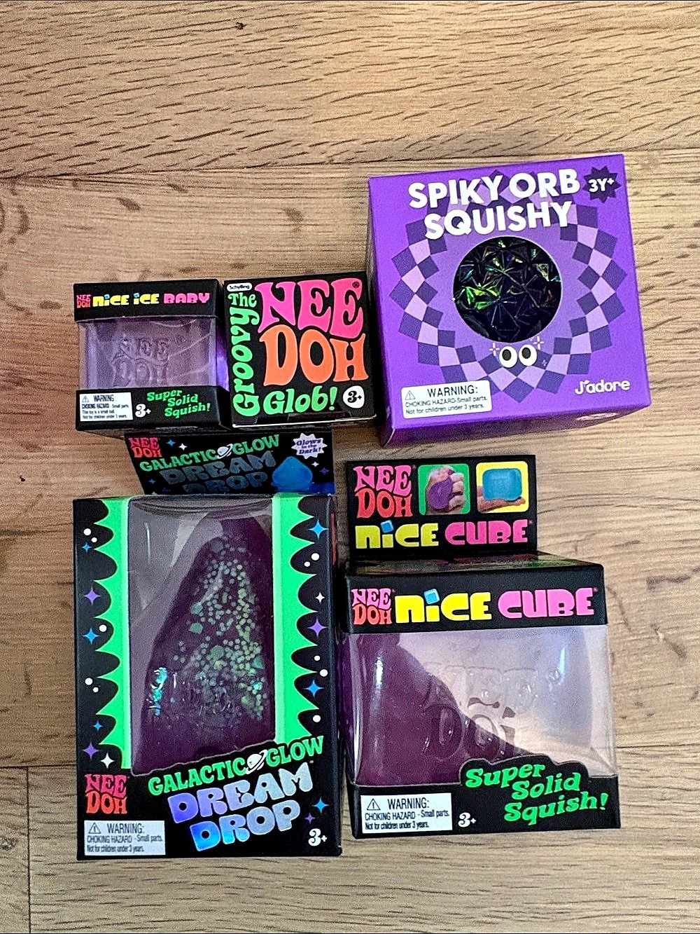 NeeDoh squishy toy assortment Purple & Green NWT. Everything pictured. Sealed.